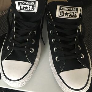 Black Converse tennis shoes